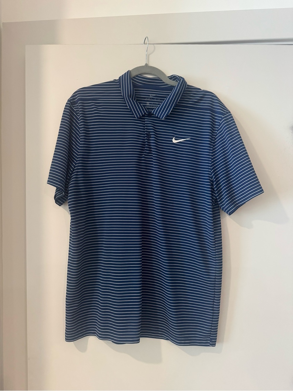 Nike Men's Navy and White Striped Golf Polo Shirt